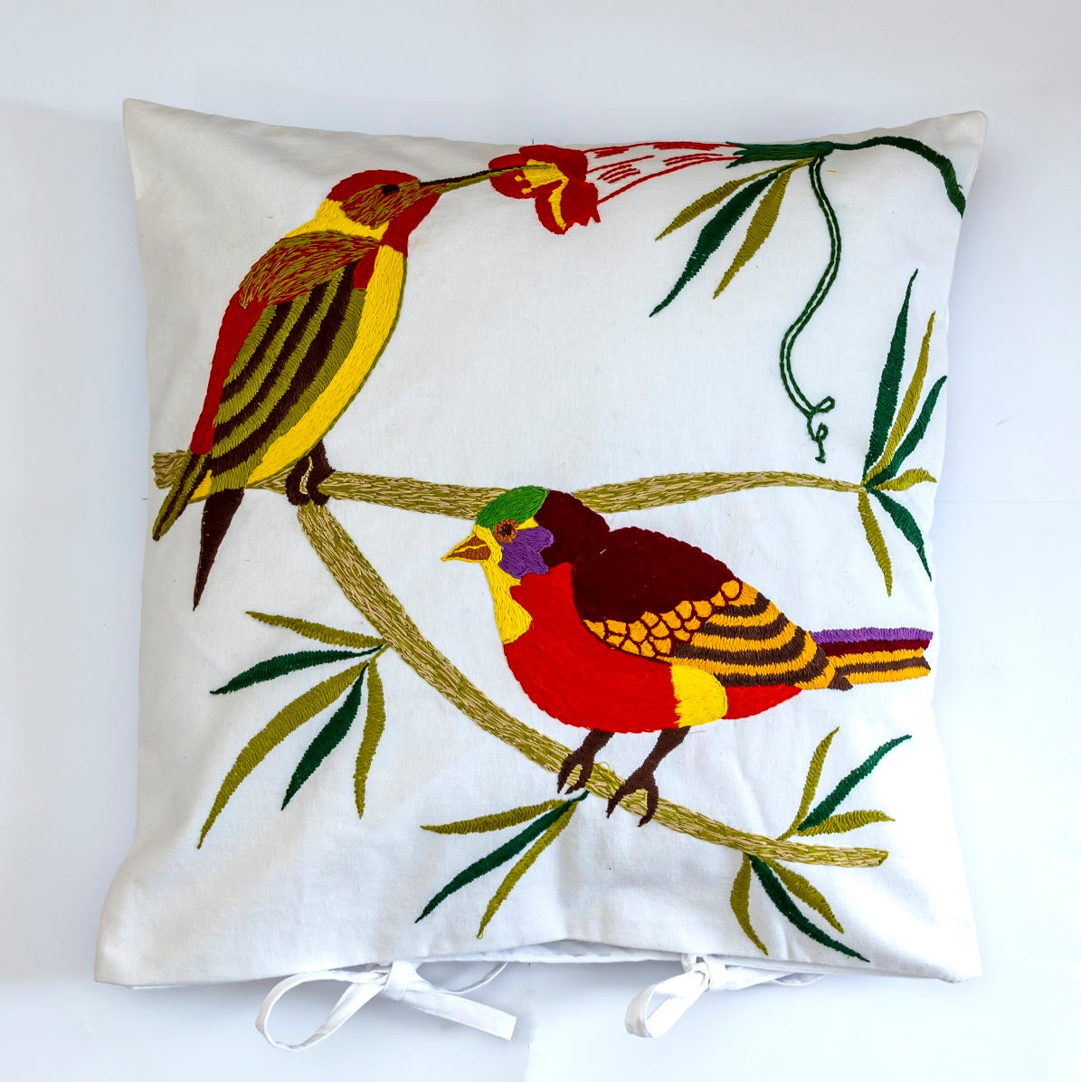 Hand embroidered cushion cover