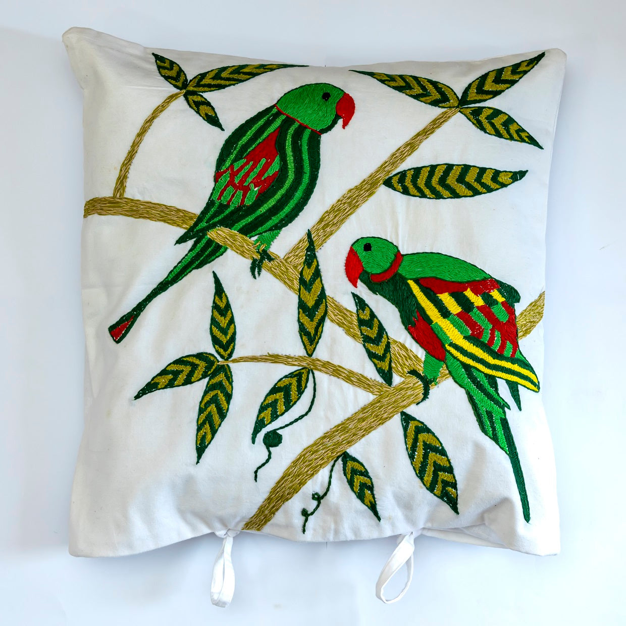 Hand embroidered cushion cover