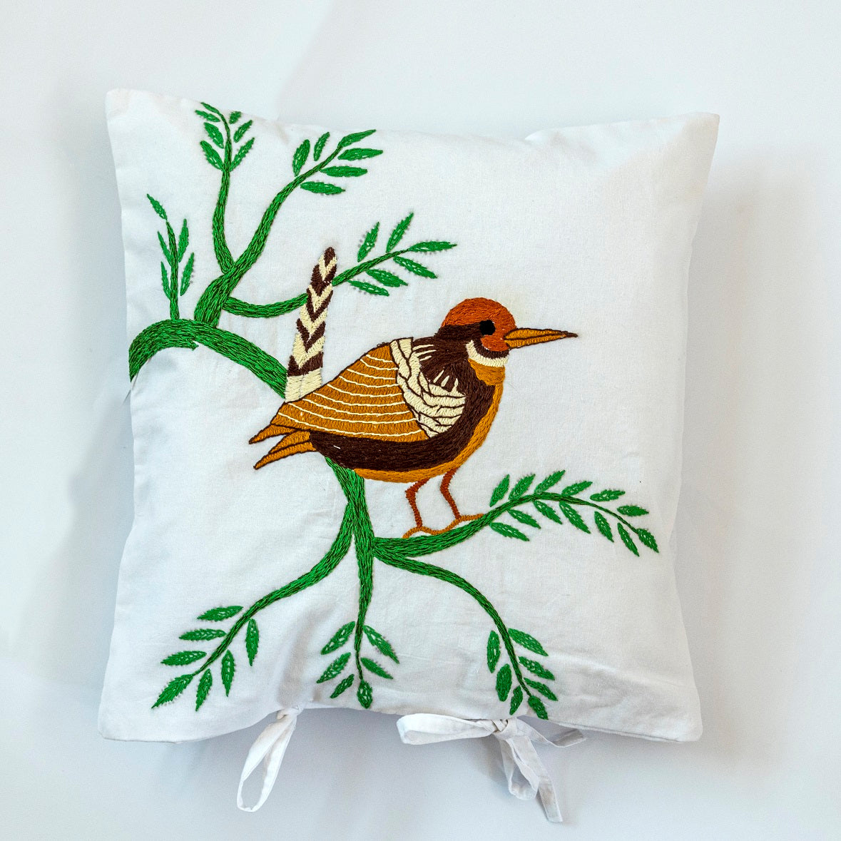 Hand embroidered cushion cover