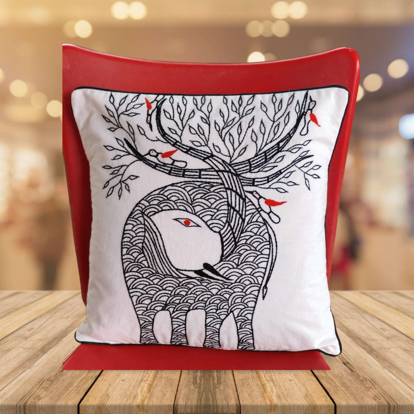 Hand embroidered cushion cover