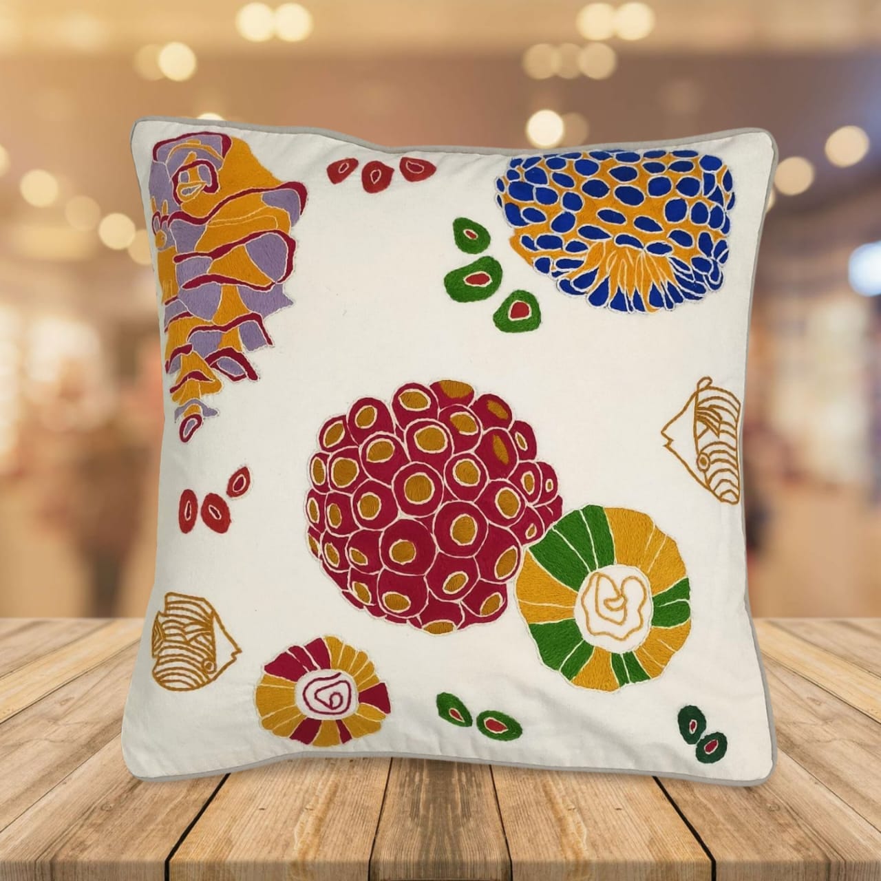 Hand embroidered cushion cover