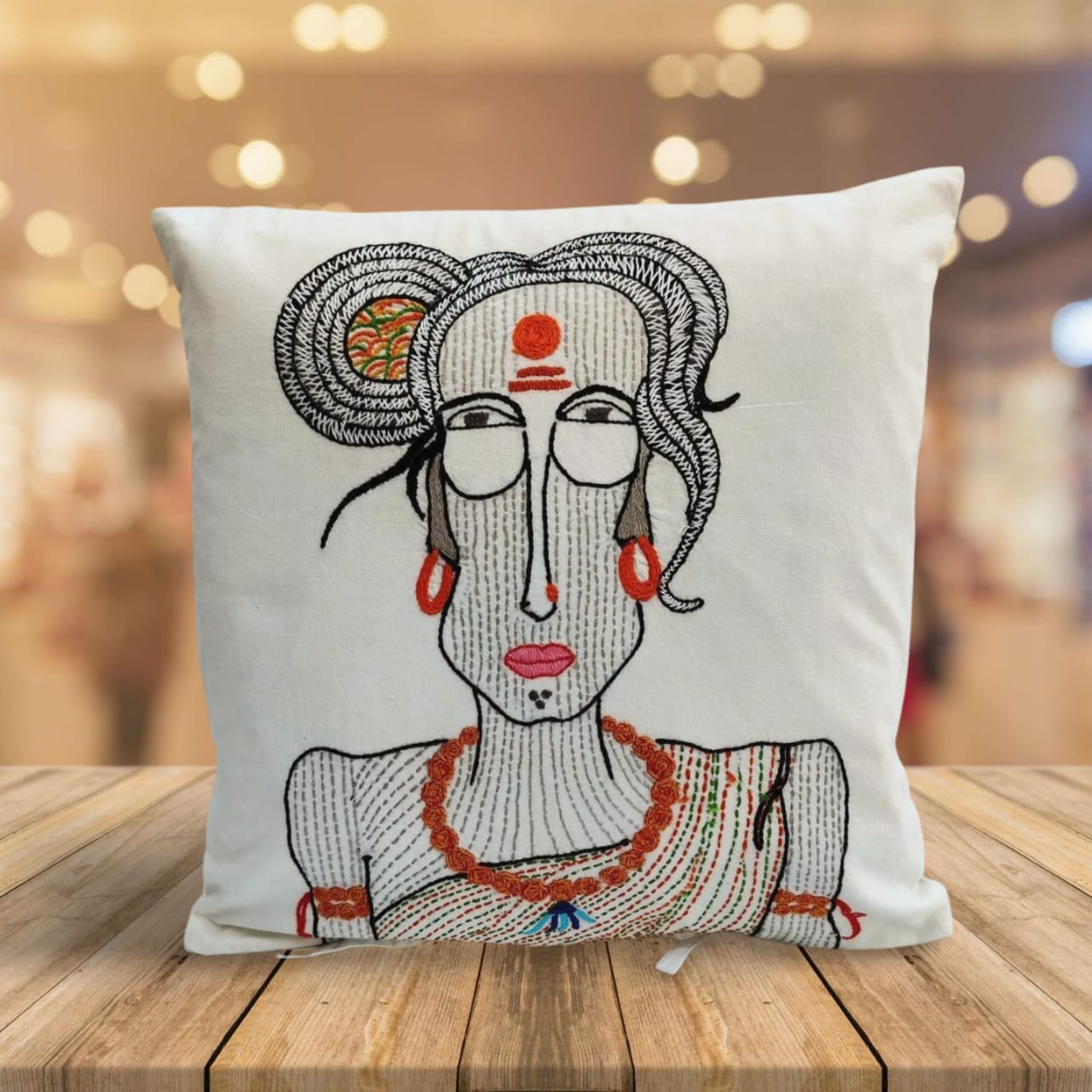 Hand embroidered cushion cover