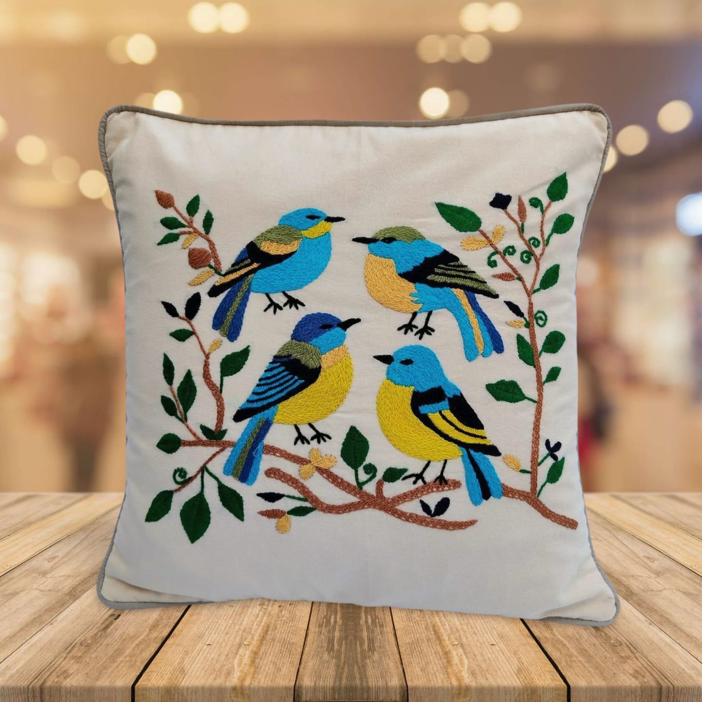 Hand embroidered cushion cover