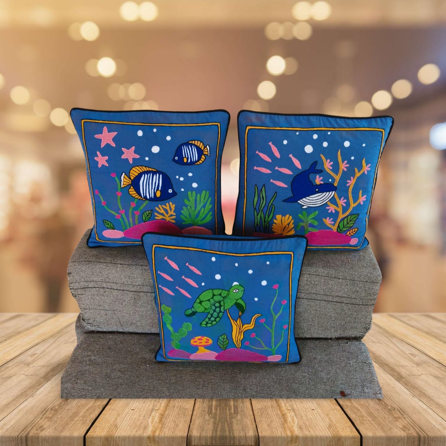 Hand embroidered cushion cover