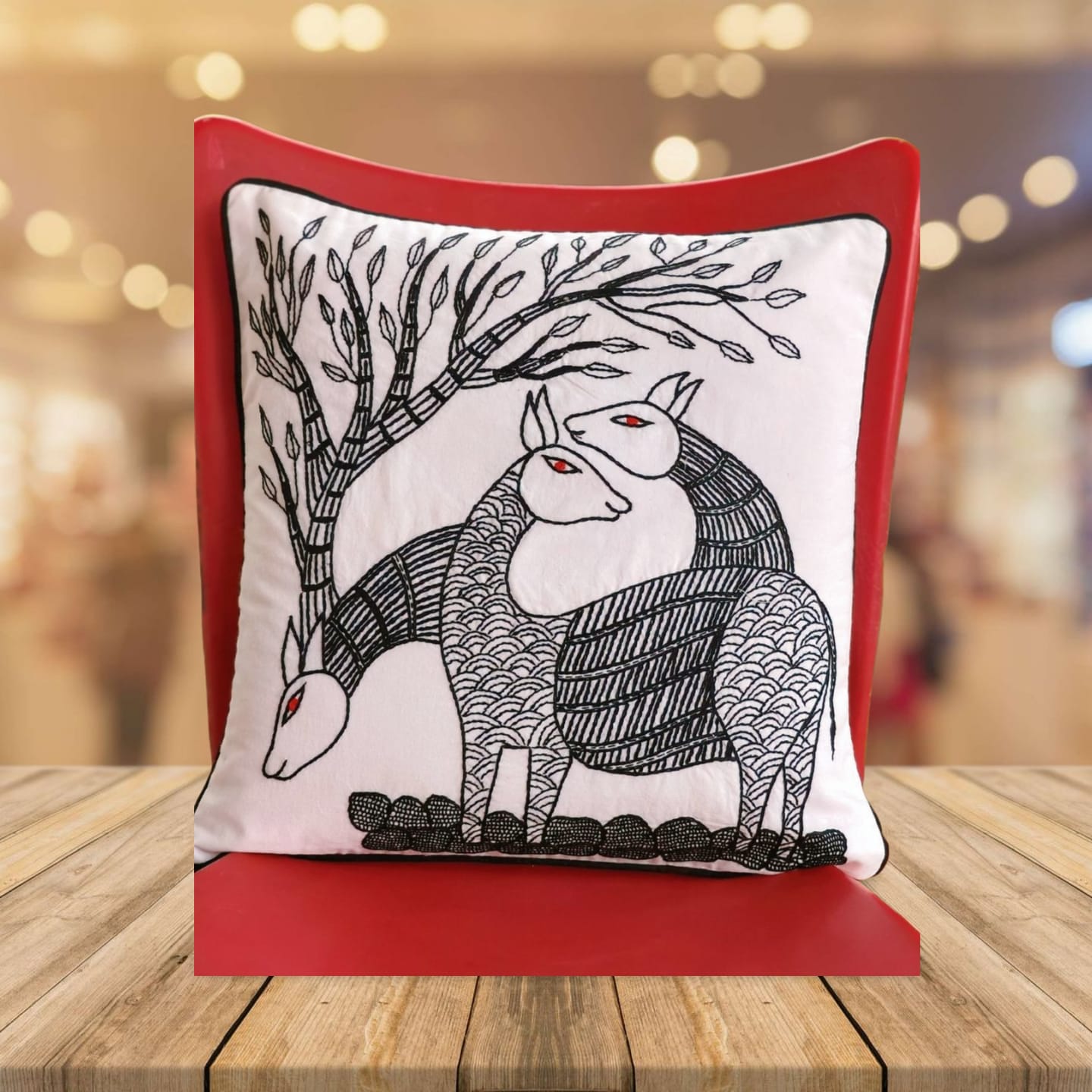 Hand embroidered cushion cover