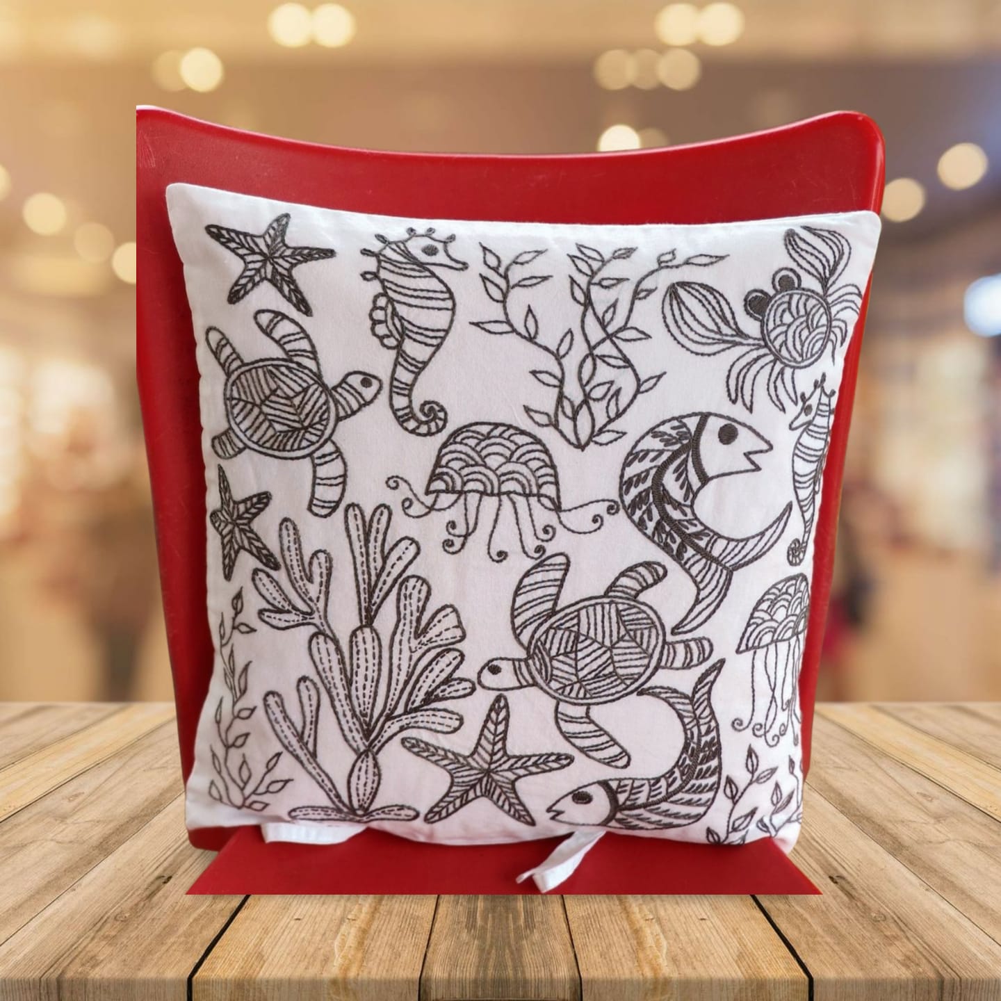 Hand embroidered cushion cover