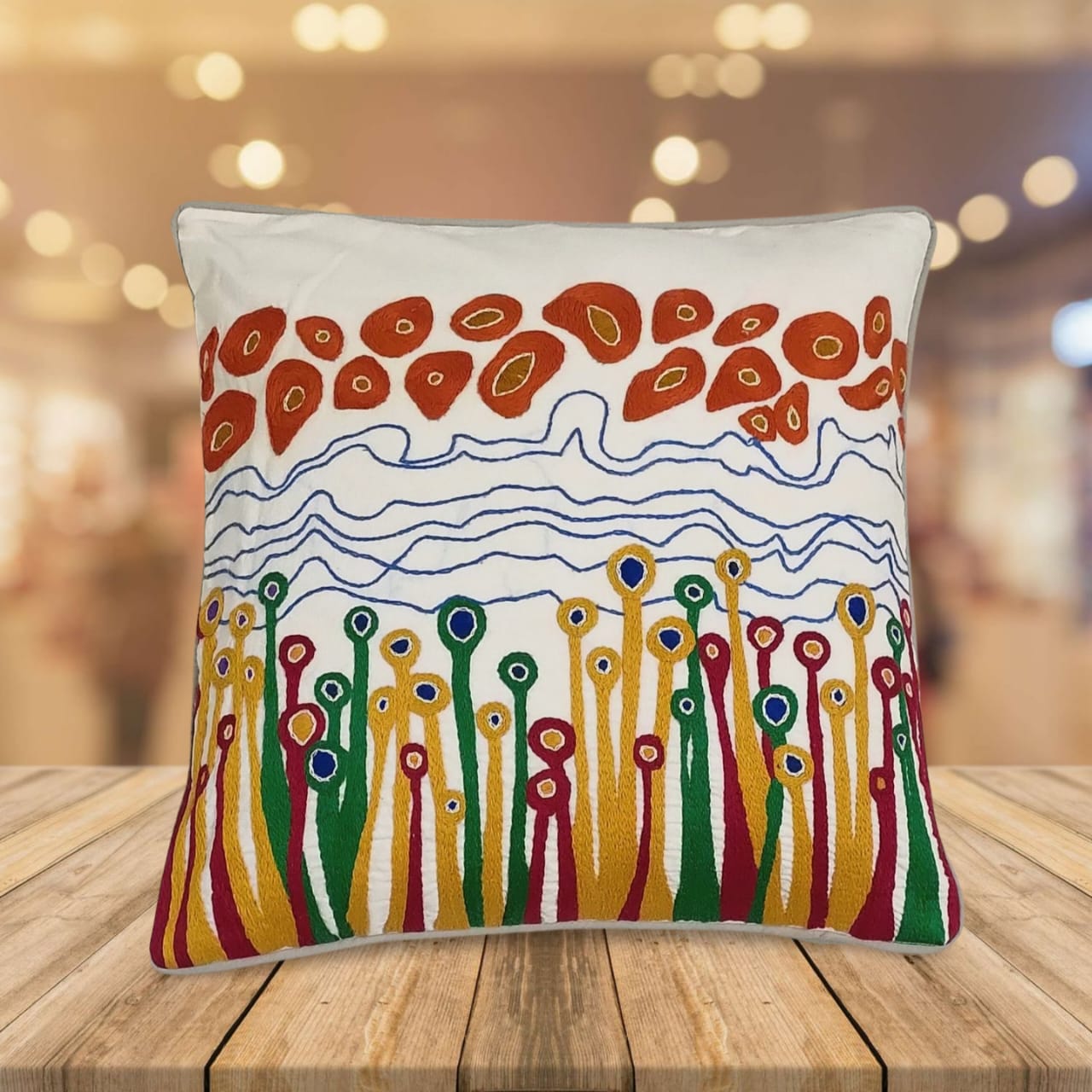 Hand embroidered cushion cover