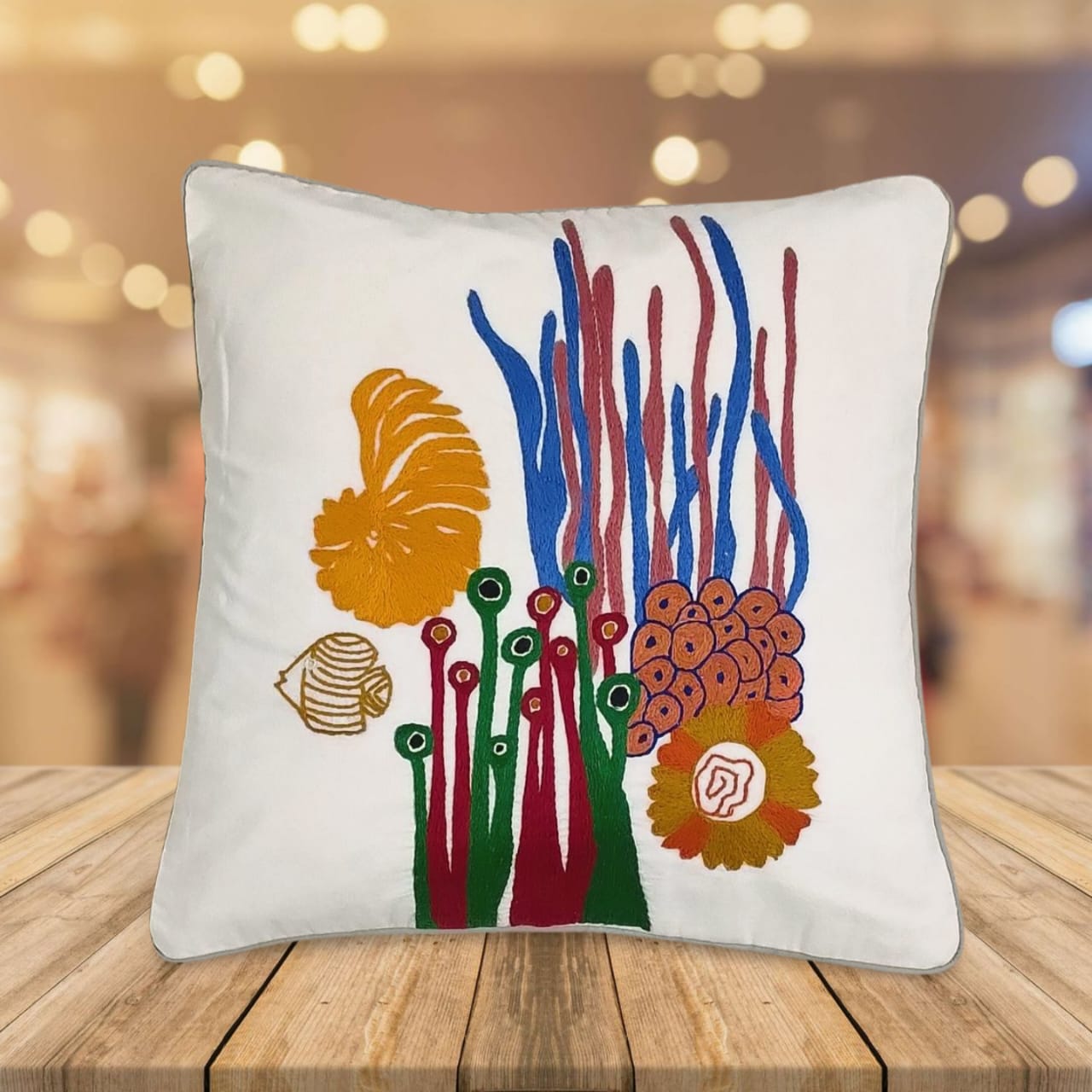 Hand embroidered cushion cover